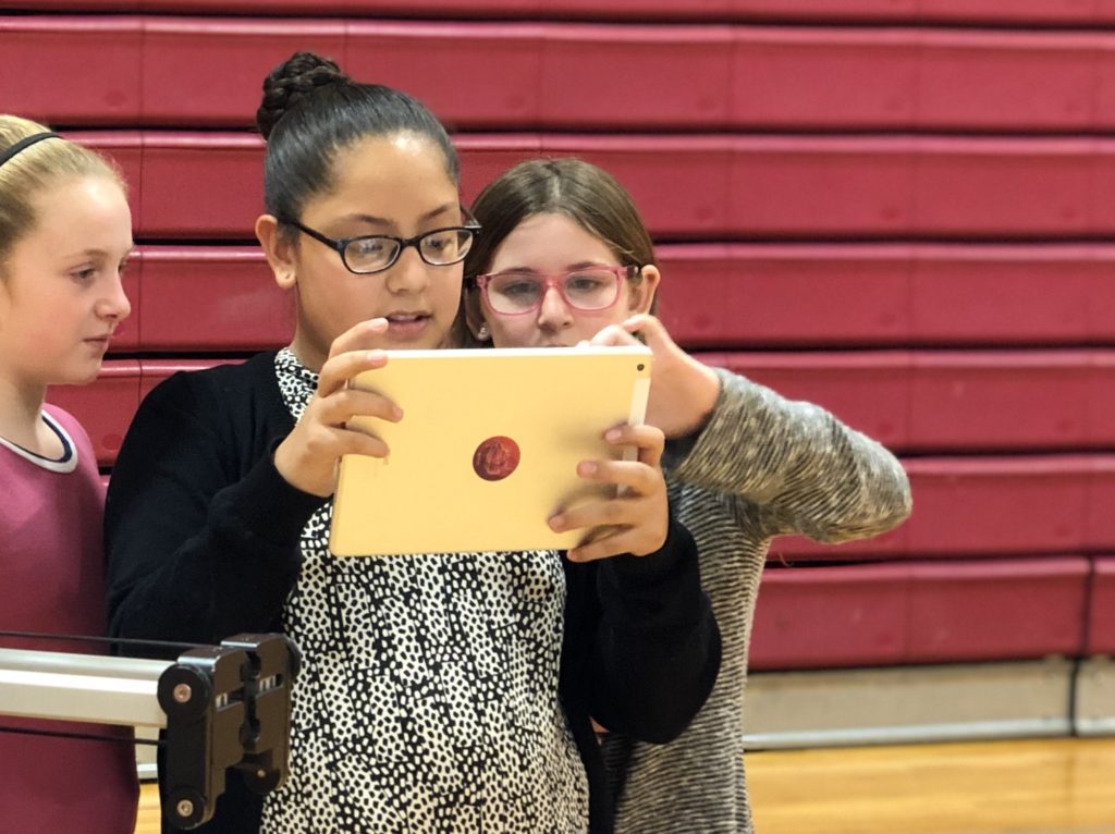 Students use an augmented reality tool to capture their learning.
